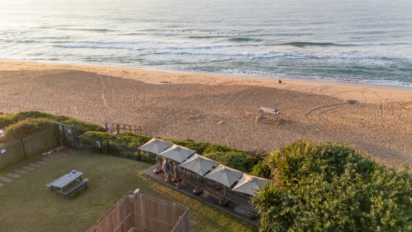 Looking down over the beach clubhouse lawns to Salt Rock beach